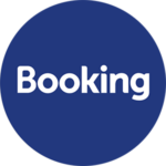 Ein blaues, rundes Logo mit dem Wort „Booking“ in fetten weißen Buchstaben. Das Design ist schlicht und in einer modernen Schriftart gehalten, was ein professionelles und zeitgenössisches Gefühl vermittelt – eine perfekte visuelle Empfehlung für moderne Unternehmen.